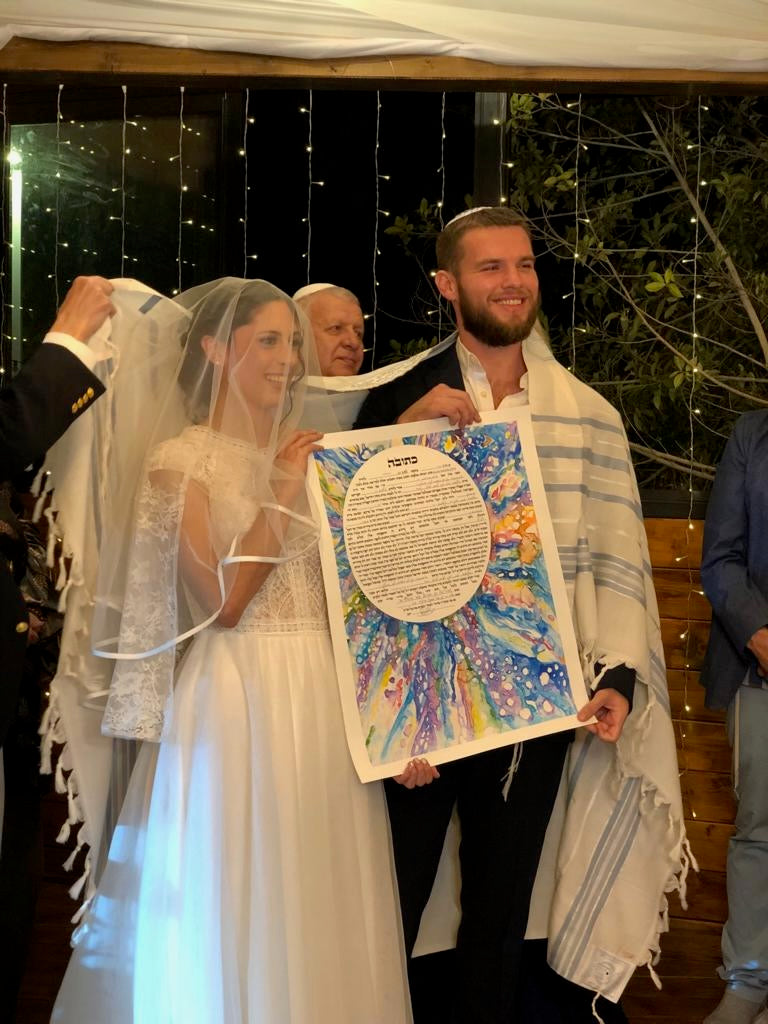 Happy Bride and Groom With Custom Ketubah