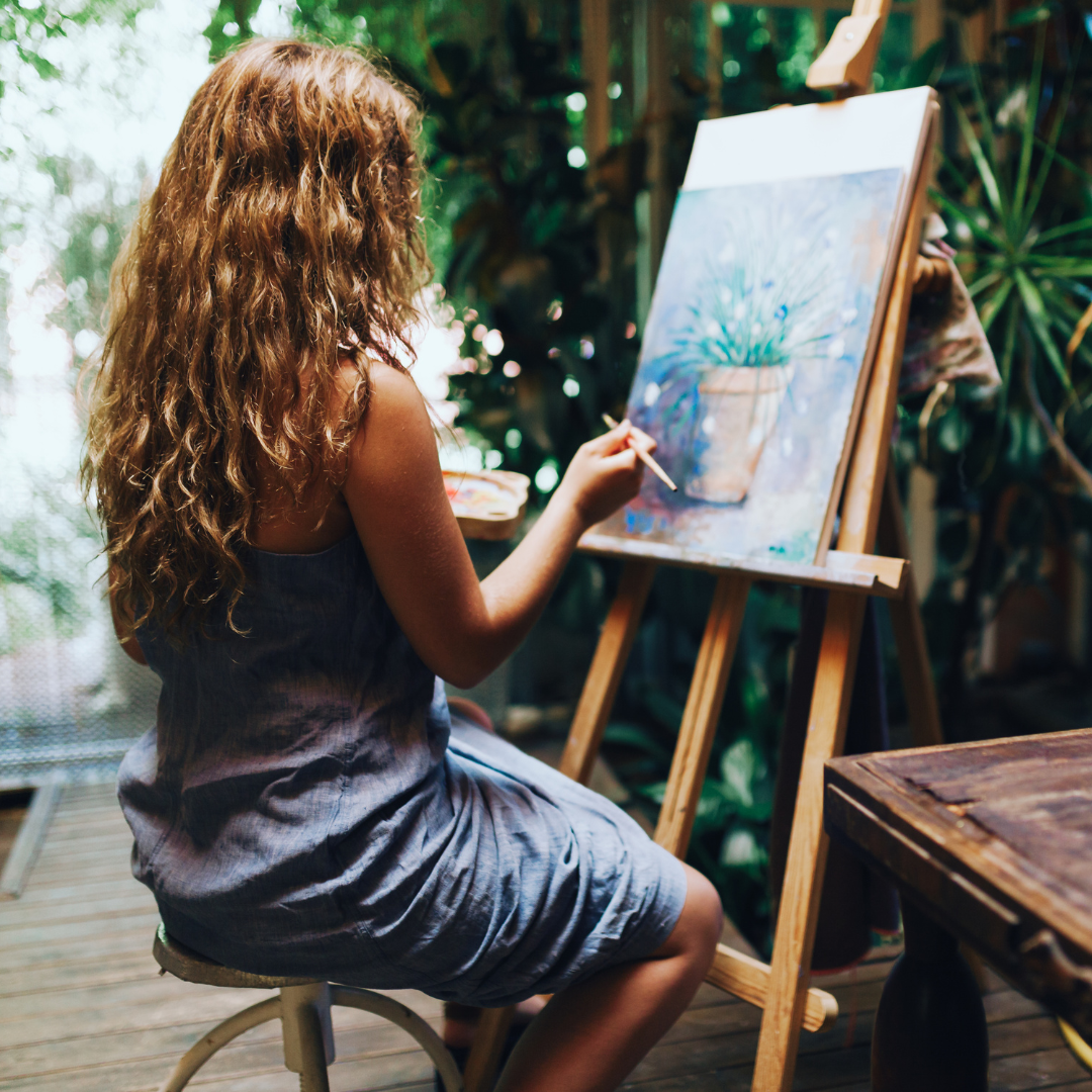 girl painting alone